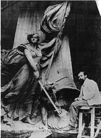 Fernand Hamar with model of Victory and the American Eagle. Fernand Hamar with model of Victory and the American Eagle.